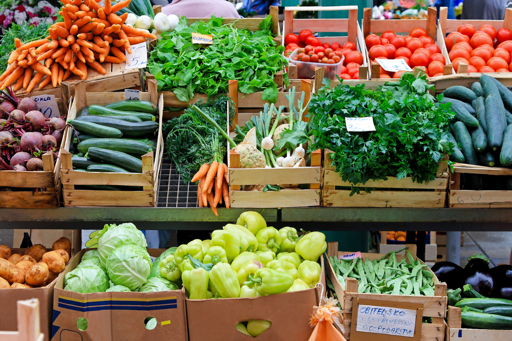 organic food arranged in crates at the supermarket